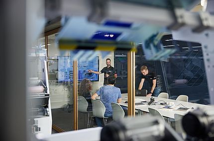  SSM textile experts conducting a customer training session at SSM Schärer Schweiter Mettler AG in Switzerland.